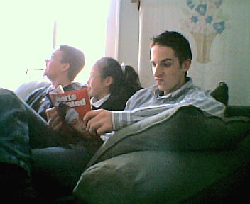 My brother Chris, My cousin Bailan, and other brother Matthew. Christmas 2003