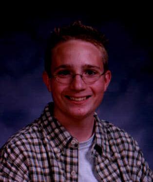 My lil bro!  He is now a year older and this picture doesn't do him justice.  My little baby is all grown up!